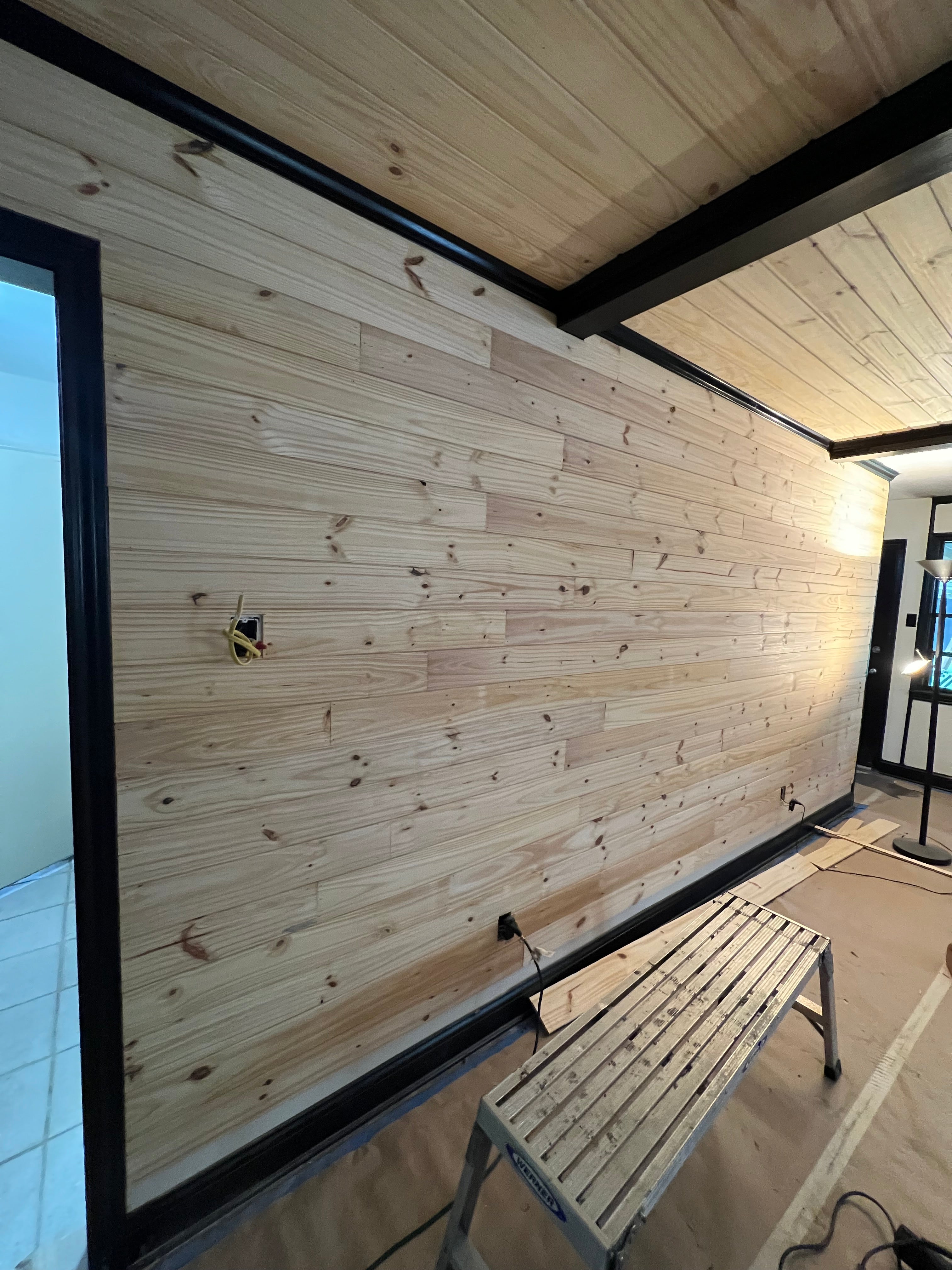 Longleaf yellow pine tongue and groove walls and ceiling in main living room